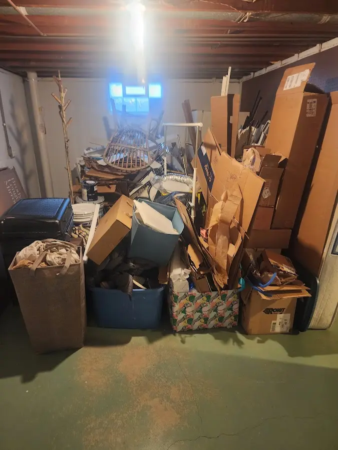 Roll-off dumpster container at job site for 20 Yard Dumpster Rental in Norwood